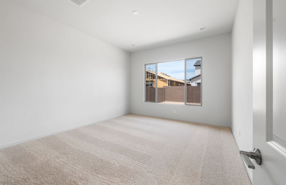 Spacious, unfurnished interior of a new home in Legado West, Queen Creek (Image 19).