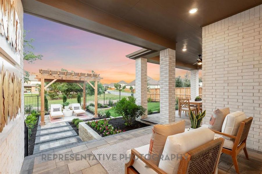 Patio terrace at dusk featuring a patio, an outdoor hangout area, a fenced backyard, and a pergola Patio terrace at dusk featuring a patio, an outdoor hangout area, a fenced backyard, and a pergola