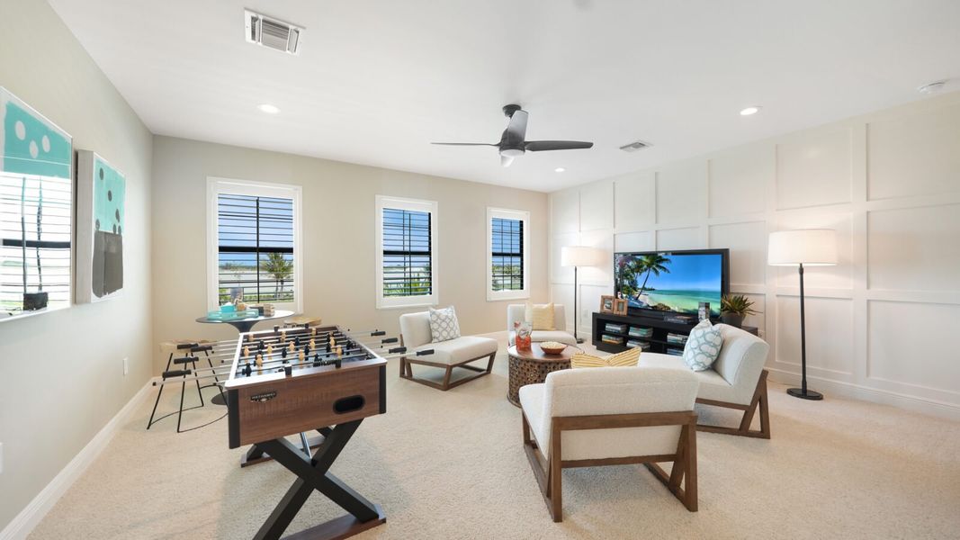 Representative furnished interior of a home built from the Artistry by Neal Communities in Grand Park, Sarasota (Image 11).