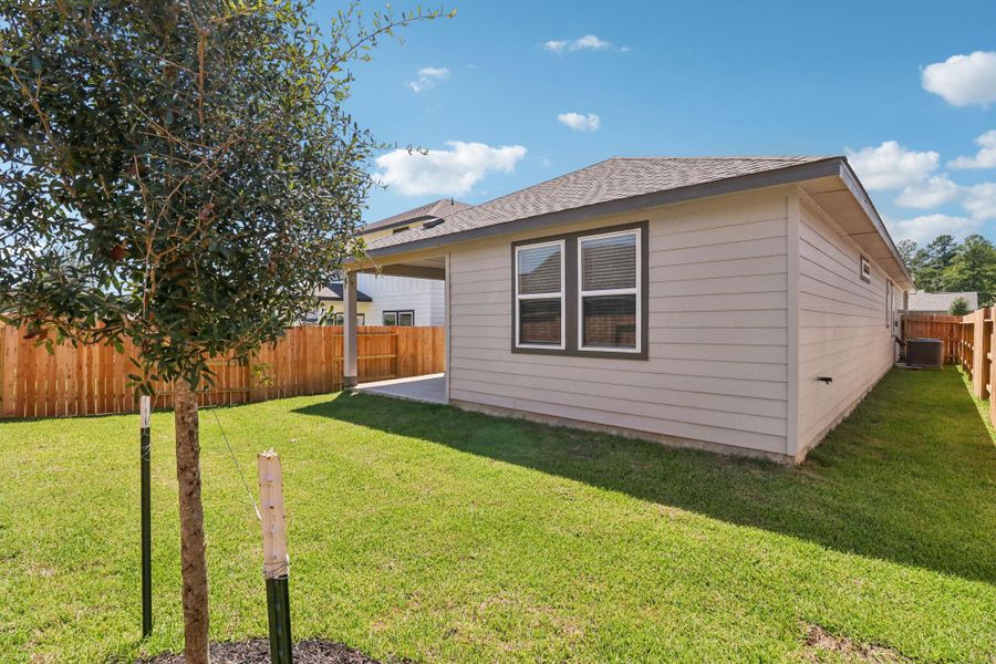 Exterior details and patio area of a home in Pine Lake Cove - Traditional Series, Montgomery (Image 19).