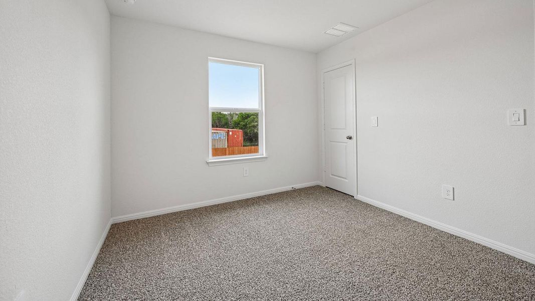 Spacious, unfurnished interior of a new home in Bar W Ranch, Leander (Image 16).
