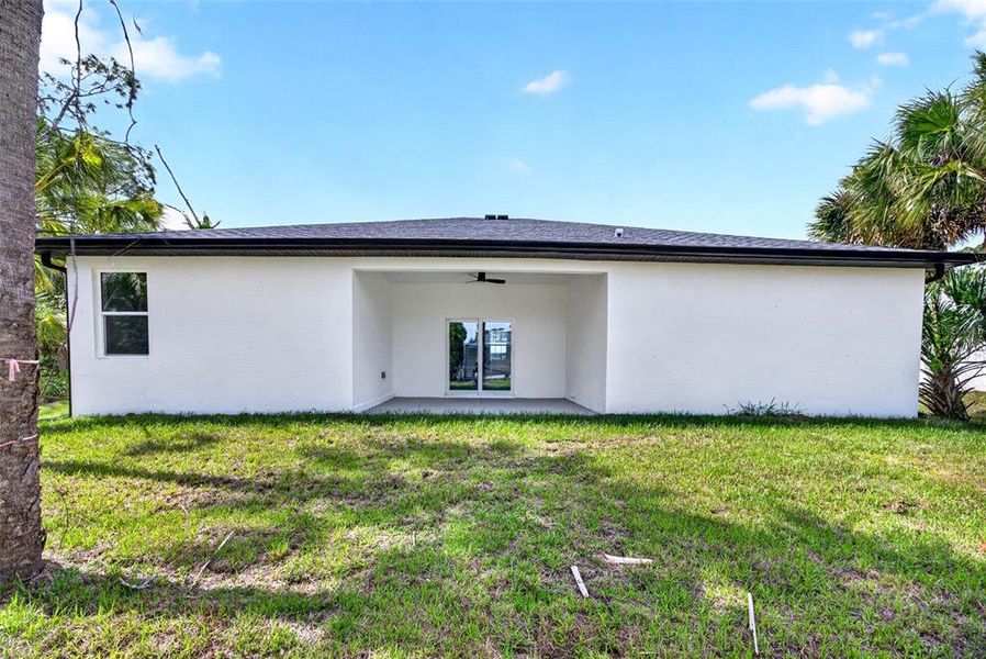 Exterior details and patio area of a home in , North Port (Image 21).