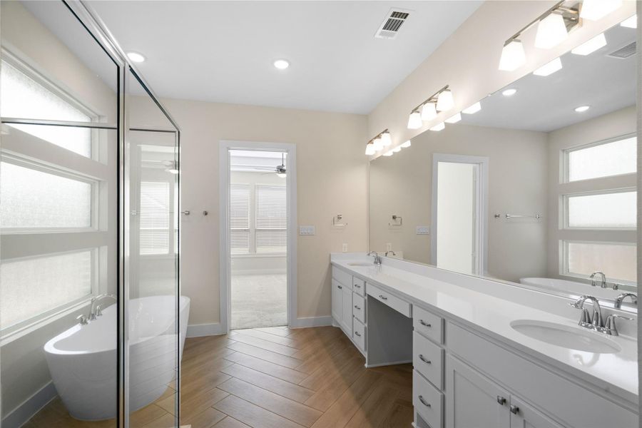 Furnished interior view inside a new home in Woodson’s Reserve, Spring (Image 7).