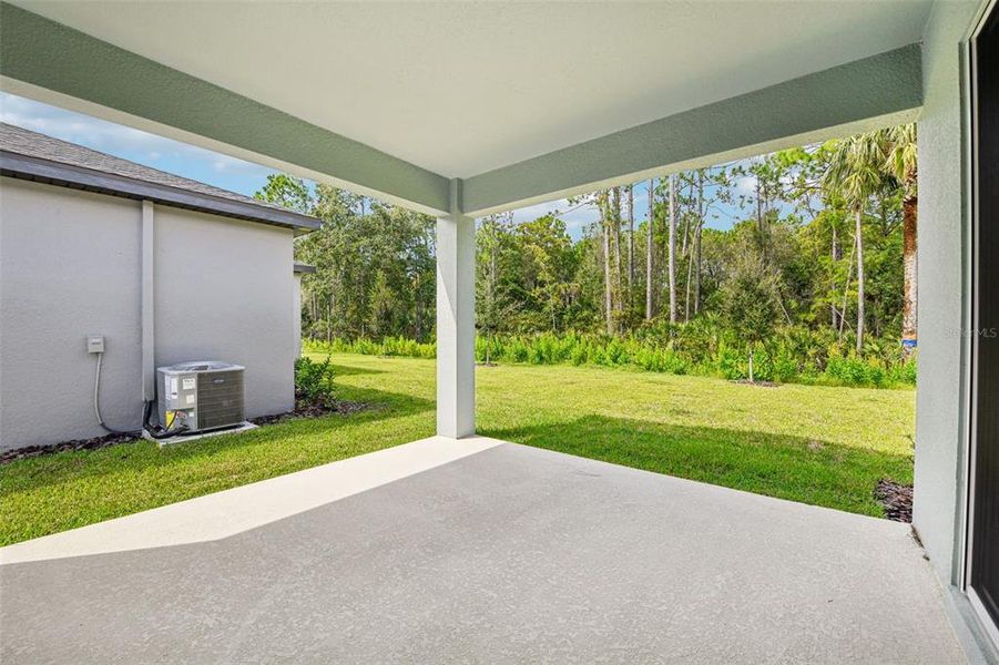 Exterior details and patio area of a home in , Ormond Beach (Image 27).