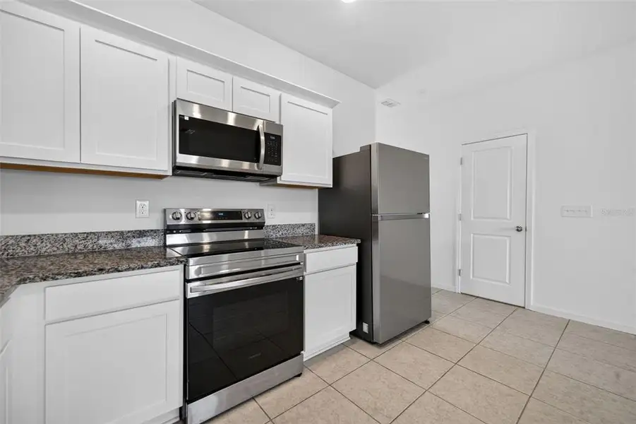 Furnished interior view inside a new home in , St. Cloud (Image 7).