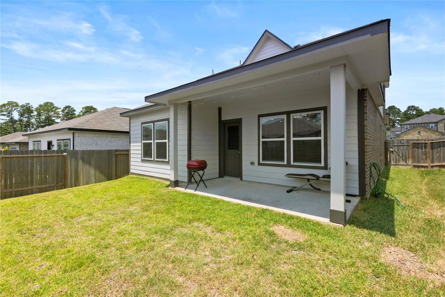 Front exterior of a new home in Lakes at Black Oak, Magnolia, TX, highlighting curb appeal (Image 26).