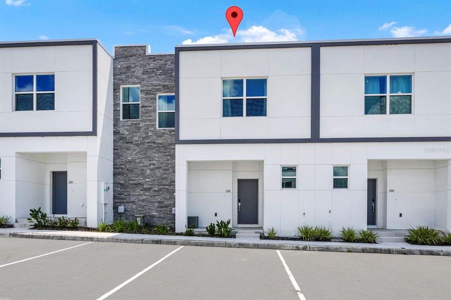 Front exterior of a new home in , Davenport, FL, highlighting curb appeal (Image 2). Front exterior of a new home in , Davenport, FL, highlighting curb appeal (Image 2).