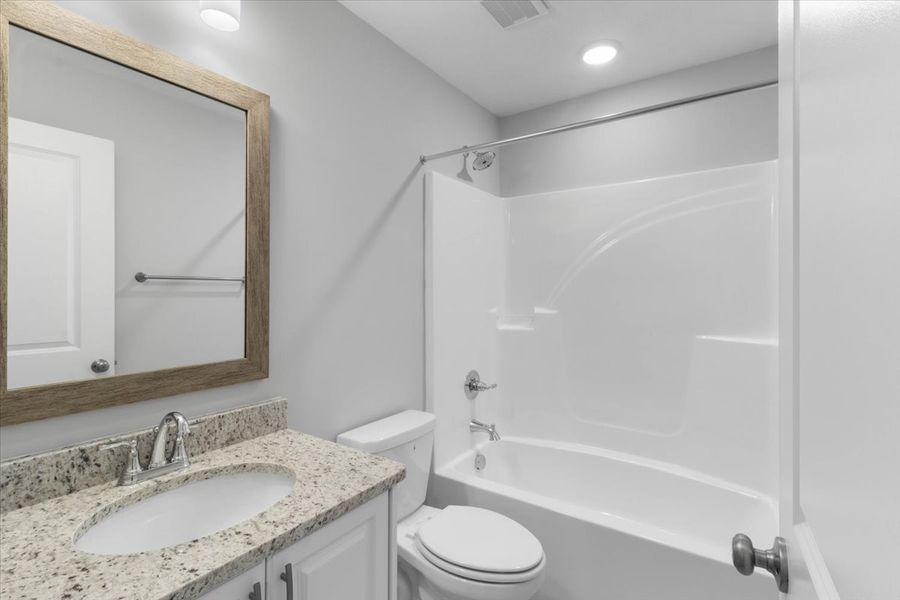Secondary Bathrooms | 5065 Anna Creek Way, The Kingsland II Plan by Ivey Homes Secondary Bathrooms | 5065 Anna Creek Way, The Kingsland II Plan by Ivey Homes