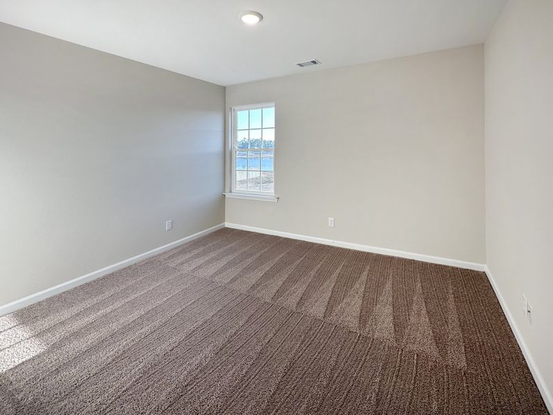 Spacious, unfurnished interior of a new home in The Village at Sassafras, Allenhurst (Image 20).