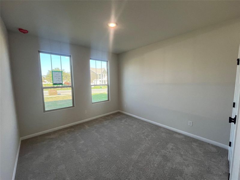 Spacious, unfurnished interior of a new home in The Cottages at Lariat, Liberty Hill (Image 26).