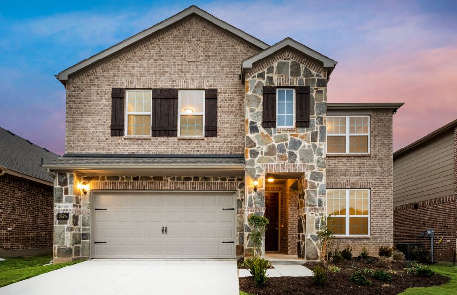 The Sweetwater, a two-story home with 2-car garage, shown with Home Exterior 34