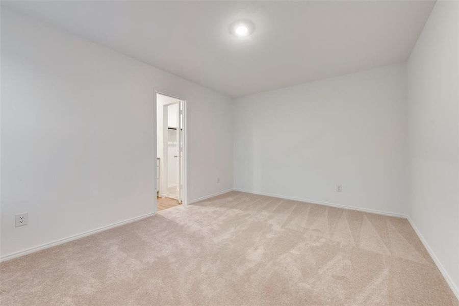 Spare room with light carpet