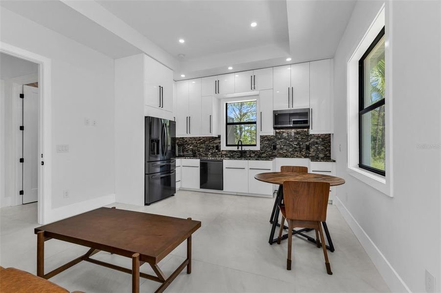 Furnished interior view inside a new home in , North Port (Image 32).