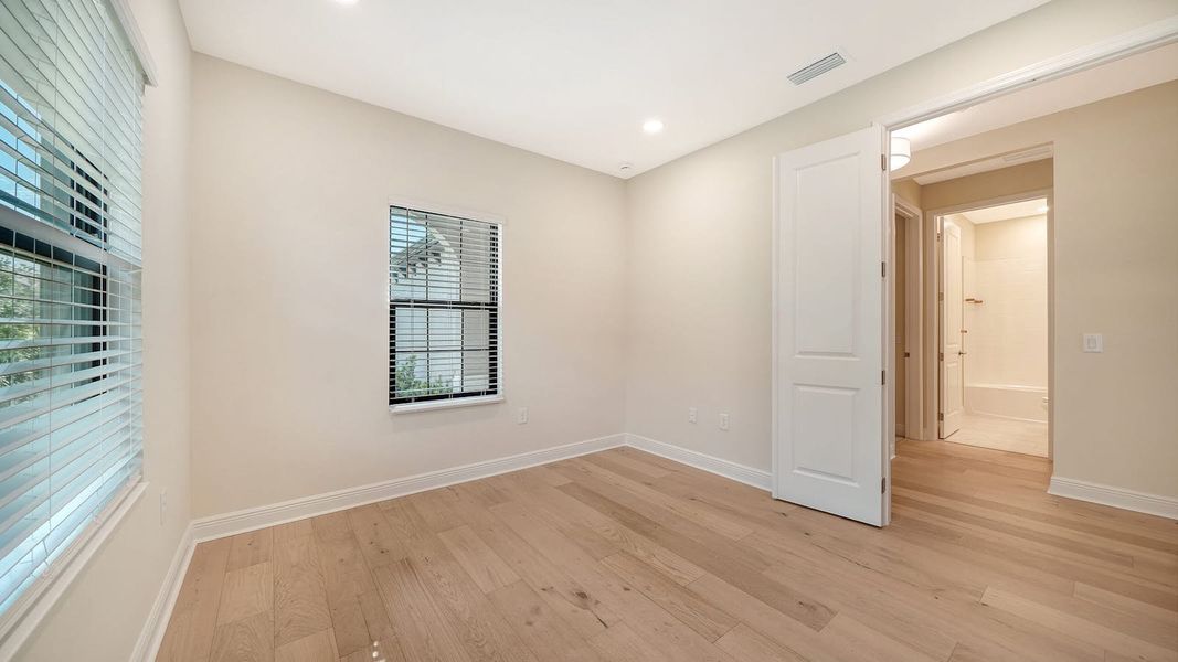 Spacious, unfurnished interior of a new home in Vistera of Venice Real Estate and Homes for Sale in Venice, FL - Neal Communities, Nokomis (Image 28).