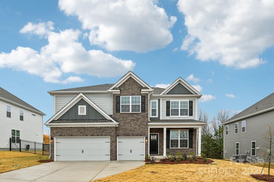 Front exterior of a new home in Sylvan Creek, Denver, NC, highlighting curb appeal (Image 1). Front exterior of a new home in Sylvan Creek, Denver, NC, highlighting curb appeal (Image 1).