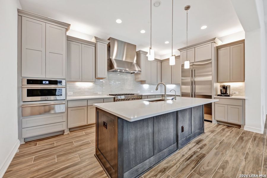 Furnished interior view inside a new home in El Sonido at Campanas, San Antonio (Image 8).