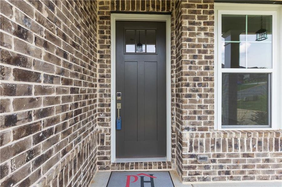 Exterior details and patio area of a home in Traditions of Braselton, Jefferson (Image 3).