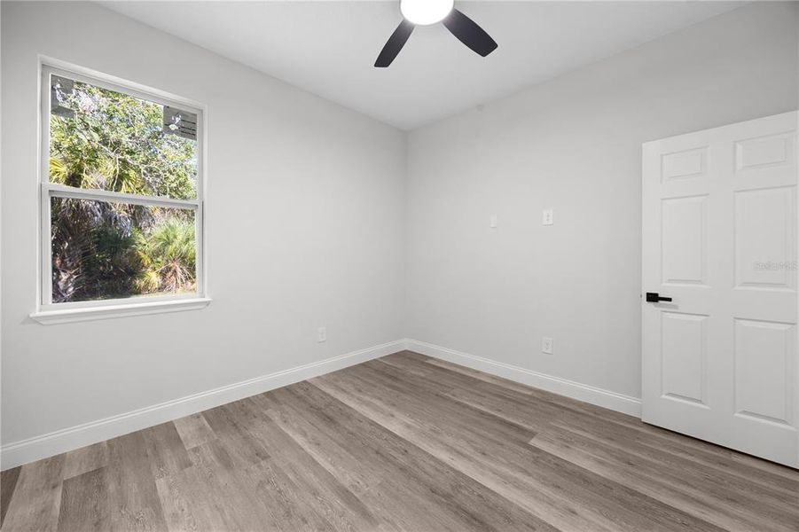 Spacious, unfurnished interior of a new home in , Port Charlotte (Image 27).