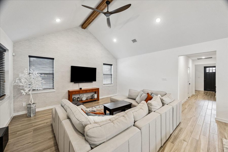 The thoughtfully designed open layout allows natural gathering spaces while still feeling warm, inviting, and functional for everyday living.