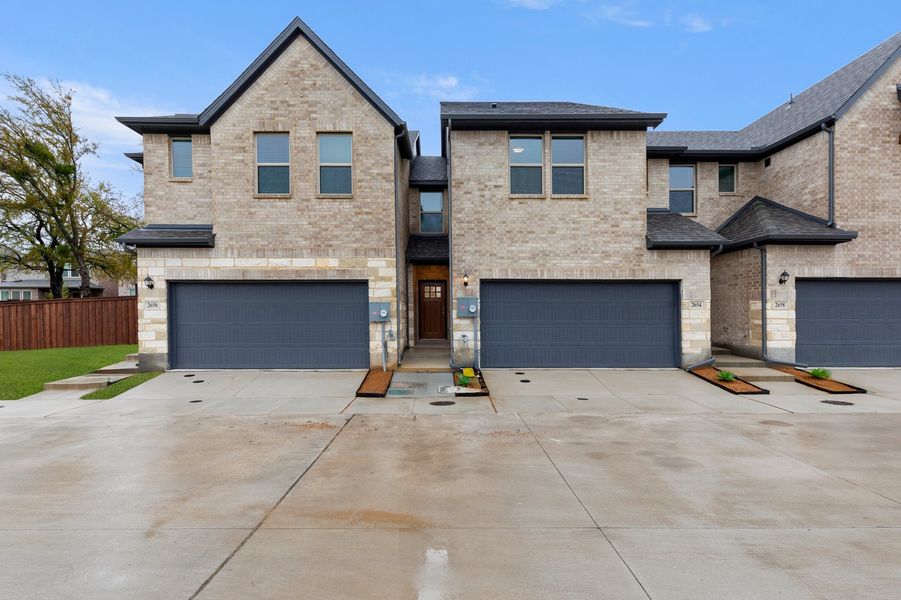 Front exterior of a new home in Sereno Oaks, Dallas, TX, highlighting curb appeal (Image 1). Front exterior of a new home in Sereno Oaks, Dallas, TX, highlighting curb appeal (Image 1).