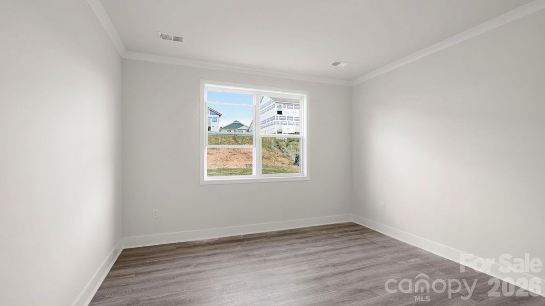 Spacious, unfurnished interior of a new home in Tap Root Farms, Hendersonville (Image 17).