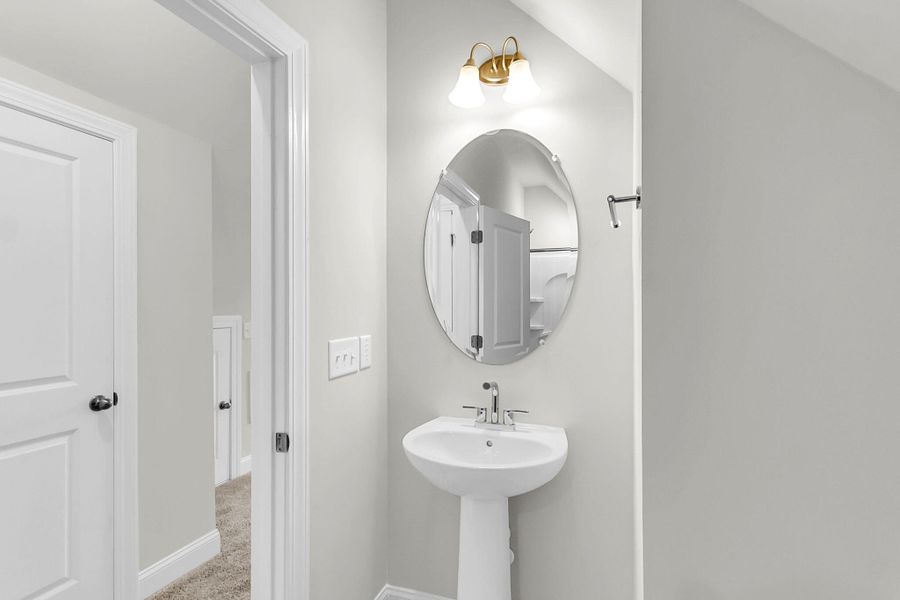 Furnished interior view inside a new home in Tidewater at Lakes of Cane Bay, Summerville (Image 7).