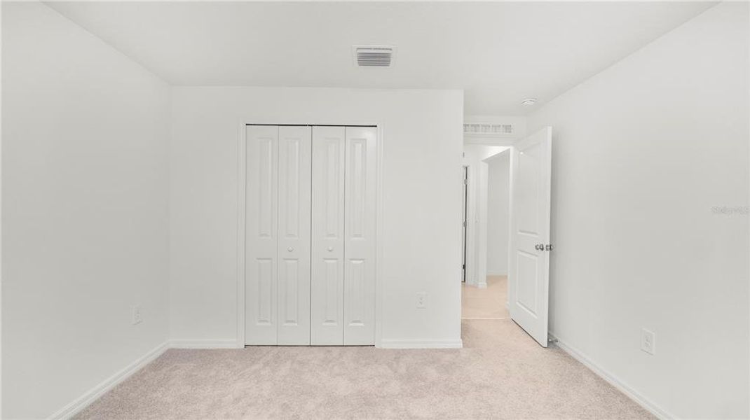 Spacious, unfurnished interior of a new home in Cypress Point at Lake Parker: The Estates, Lakeland (Image 39).