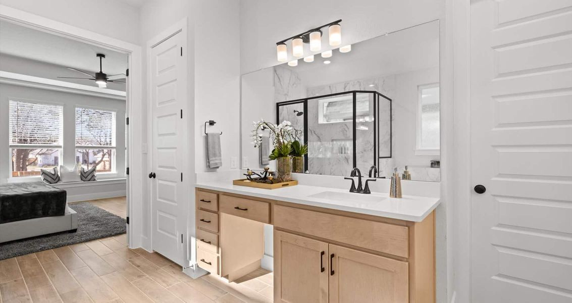 Furnished interior view inside a new home in 6 Creeks, Kyle (Image 11).