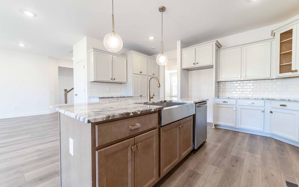 Furnished interior view inside a new home in Aden Woods, Fairview (Image 8).