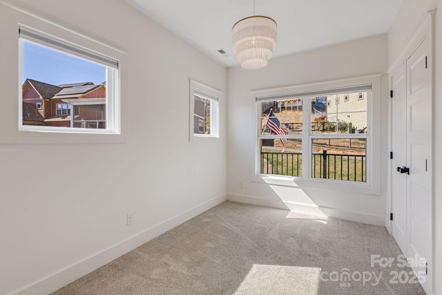Spacious, unfurnished interior of a new home in , Black Mountain (Image 37).