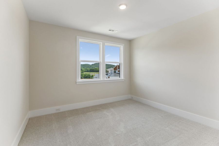Representative unfurnished interior of a home built from the Harrington by John Wieland in Willow Ridge, Nolensville (Image 28).