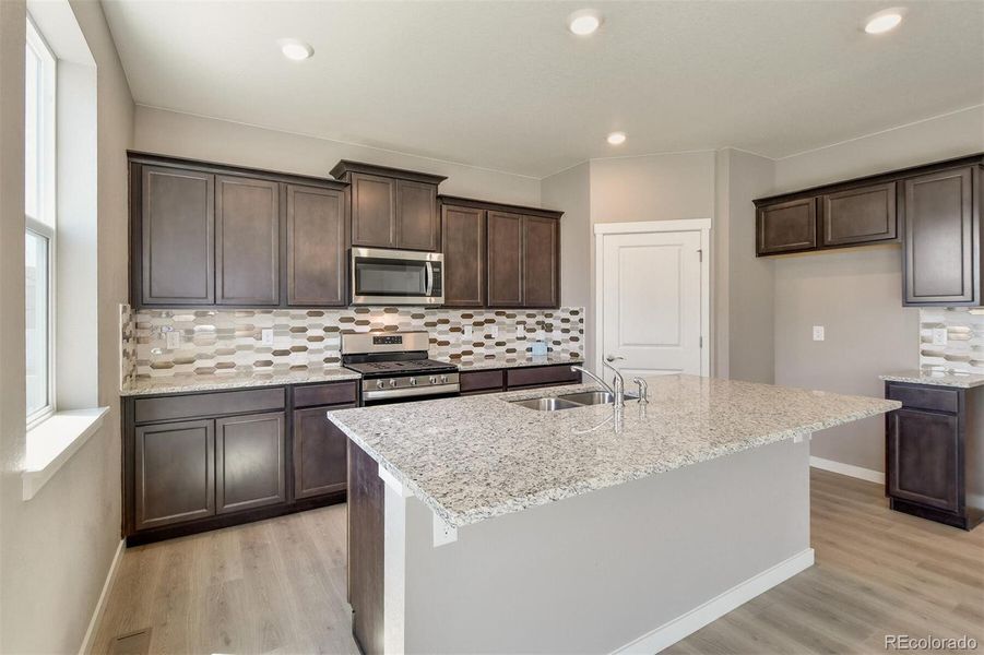 Furnished interior view inside a new home in Timberleaf, Thornton (Image 5).