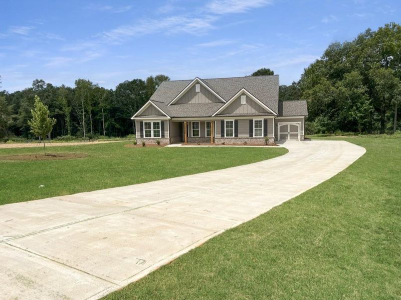 Front exterior of a new home in , Good Hope, GA, highlighting curb appeal (Image 2).