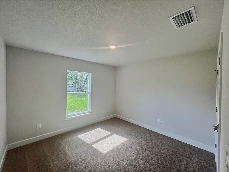 Spacious, unfurnished interior of a new home in Orange Blossom Hills, Summerfield (Image 8).