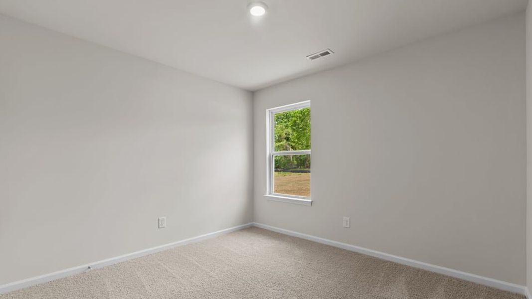 Representative unfurnished interior of a home built from the Cali by D.R. Horton in Hobbs Farm, Ayden (Image 17).