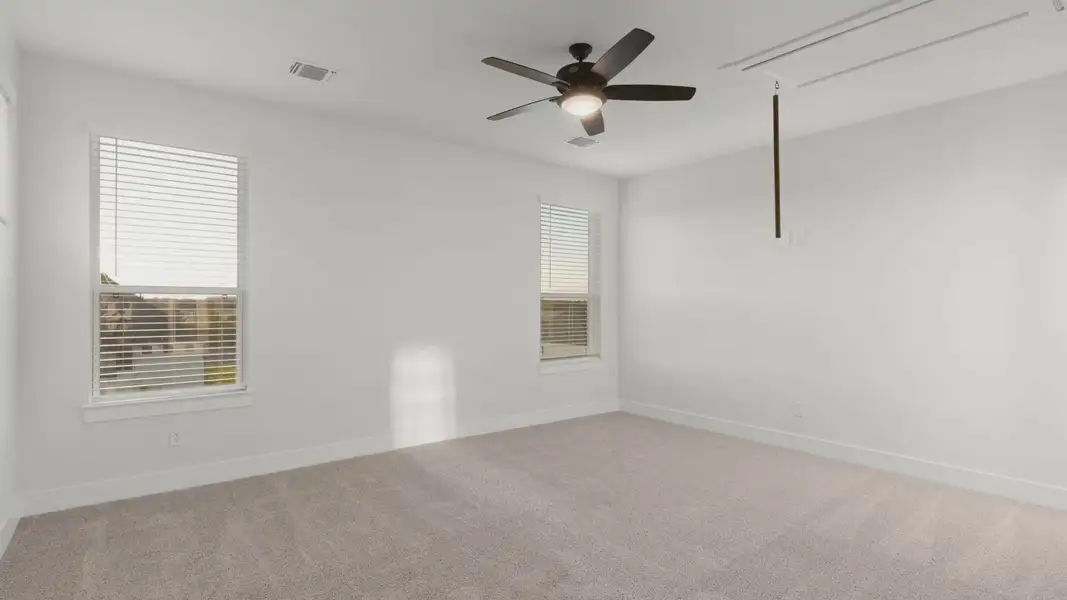 Representative unfurnished interior of a home built from the Merritt by Chesmar Homes in Feathergrass, Florence (Image 35).