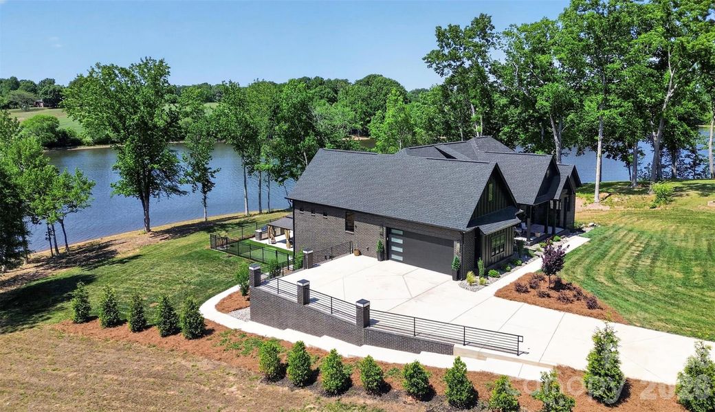 Front exterior of a new home in , Monroe, NC, highlighting curb appeal (Image 23).