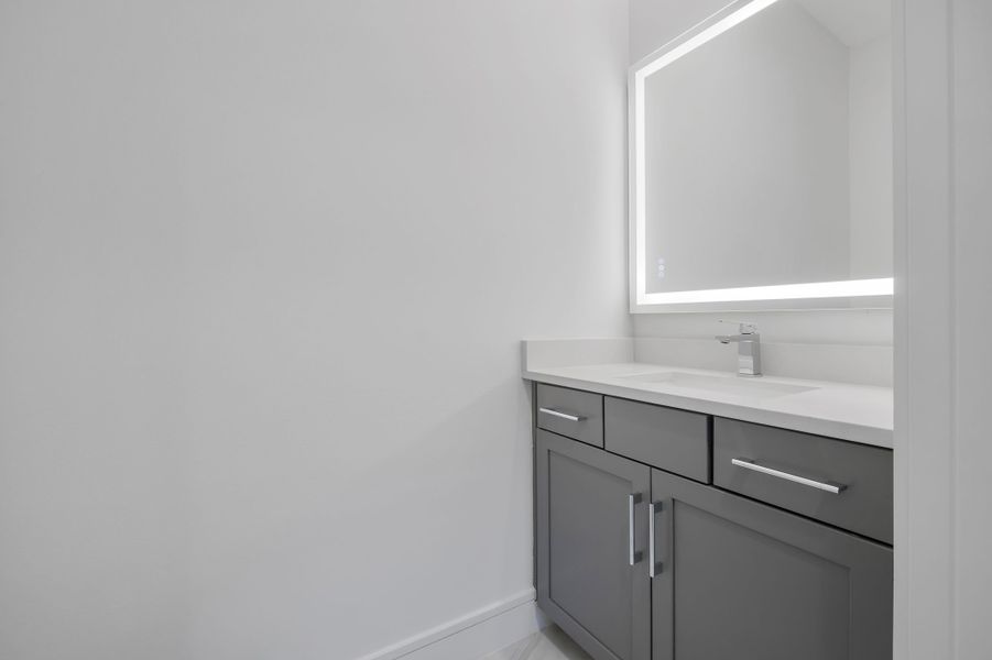 Representative furnished interior of a home built from the Courtyard 50 by ABD Development in Hampton Green at Providence, Davenport (Image 14).