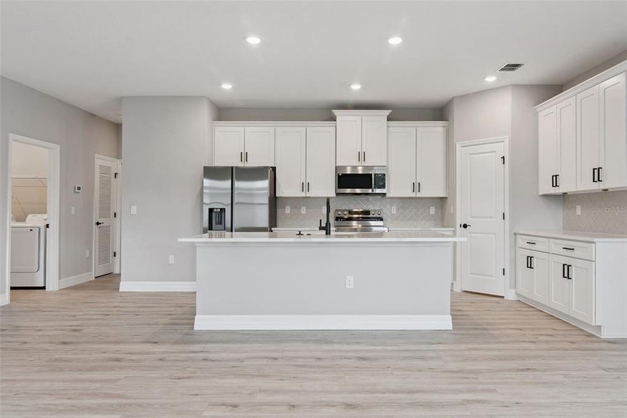 Furnished interior view inside a new home in , Ocala (Image 9).