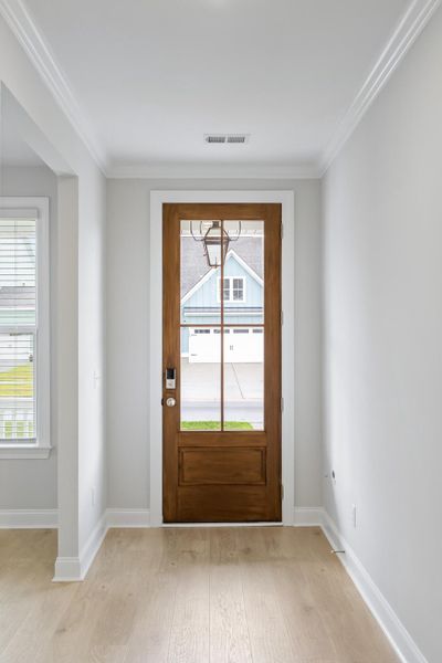 Spacious, unfurnished interior of a new home in Tidewater at Lakes of Cane Bay, Summerville (Image 26).