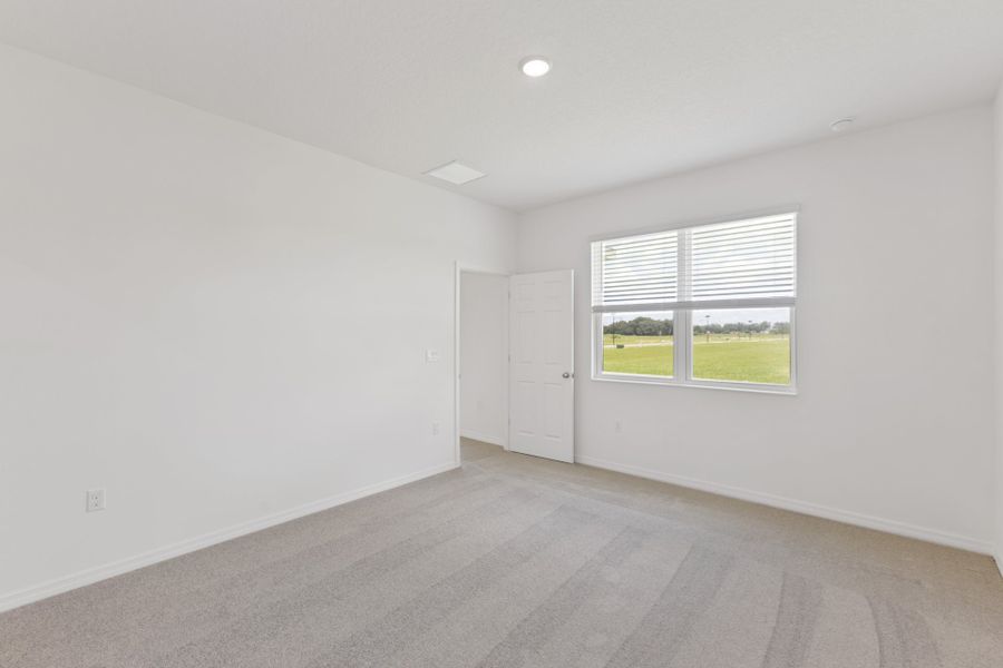Spacious, unfurnished interior of a new home in Highfield at Twisted Oaks, Wildwood (Image 9).