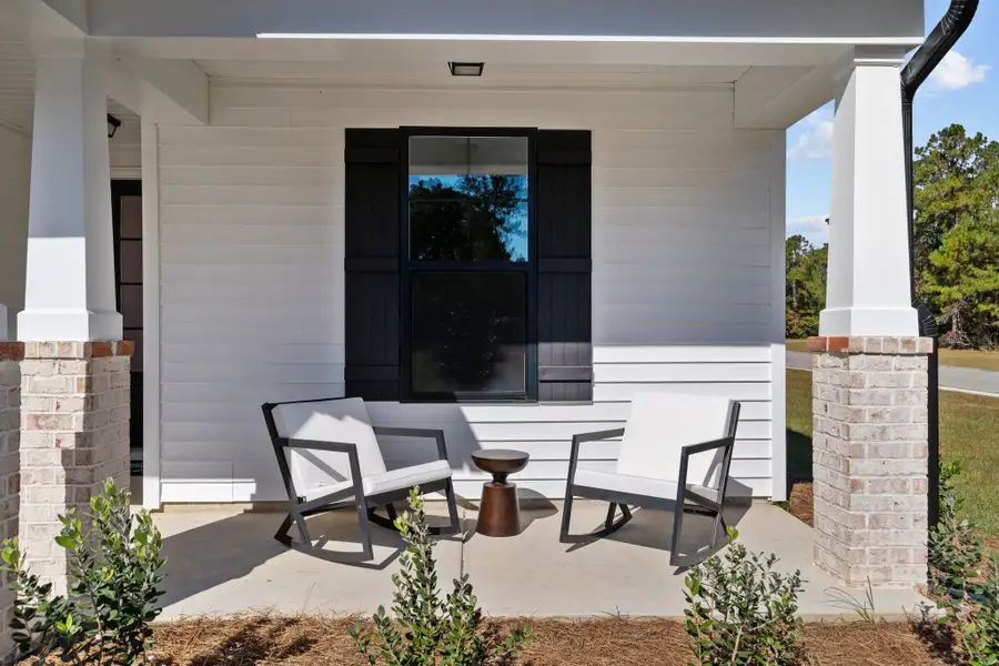 Representative exterior details of a home built from the The Cherry Grove by Chesapeake Homes in Traditions at Carolina Forest, Myrtle Beach (Image 31). Representative exterior details of a home built from the The Cherry Grove by Chesapeake Homes in Traditions at Carolina Forest, Myrtle Beach (Image 31).