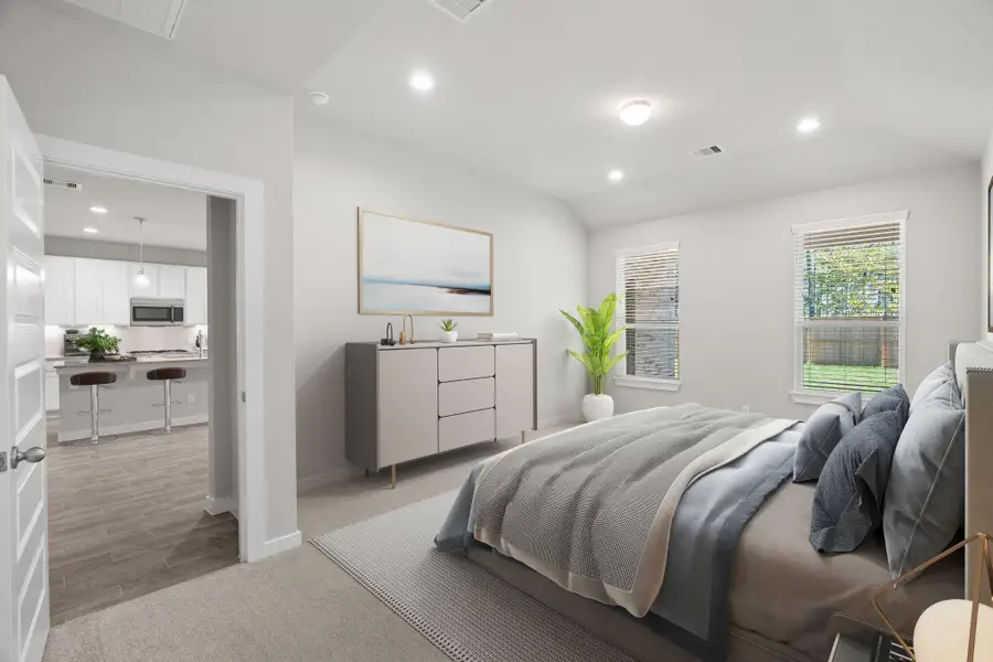 Come decompress in the stunning primary suite after a lengthy day! Experience the luxury of plush carpeting, warm paint hues, high ceilings, and large windows featuring privacy blinds. Virtual Staged. Sample photo of completed home with similar floor plan. Actual colors and selections may vary.