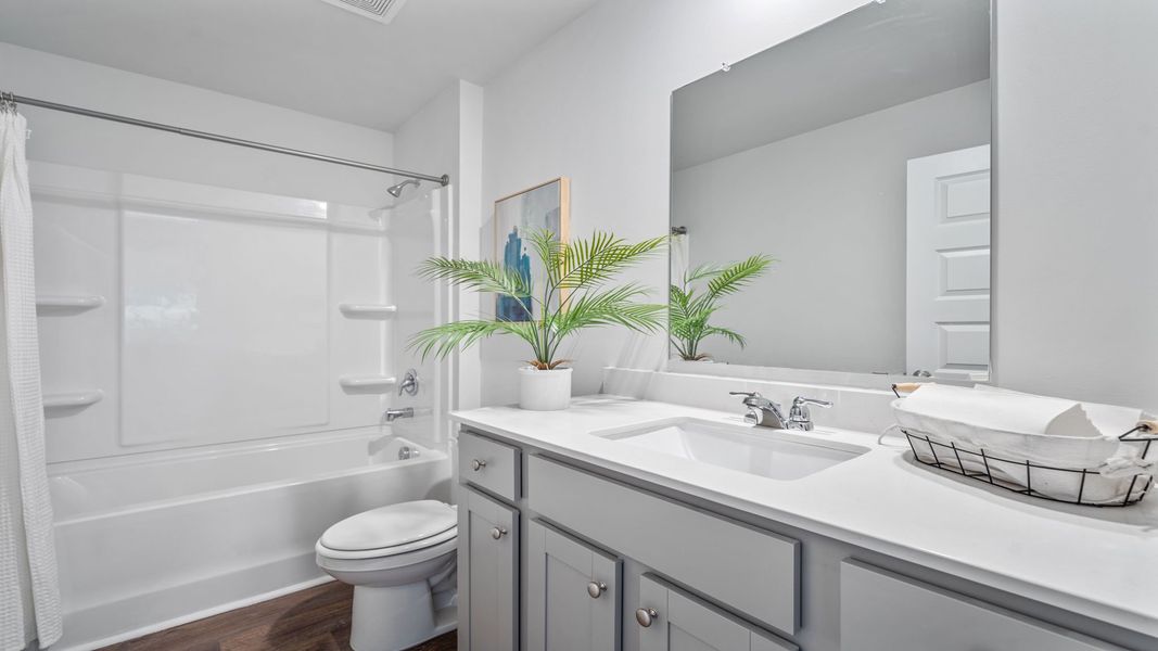 Representative furnished interior of a home built from the KERRY by D.R. Horton in Longleaf Village, Rincon (Image 11).