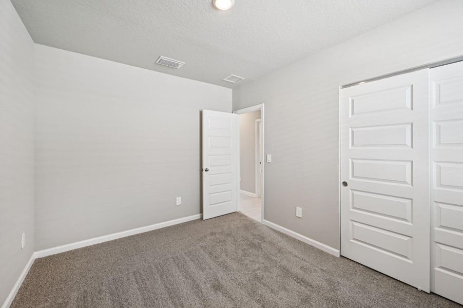 Spacious, unfurnished interior of a new home in Hampton Park - Classic Series, Vero Beach (Image 25). Spacious, unfurnished interior of a new home in Hampton Park - Classic Series, Vero Beach (Image 25).