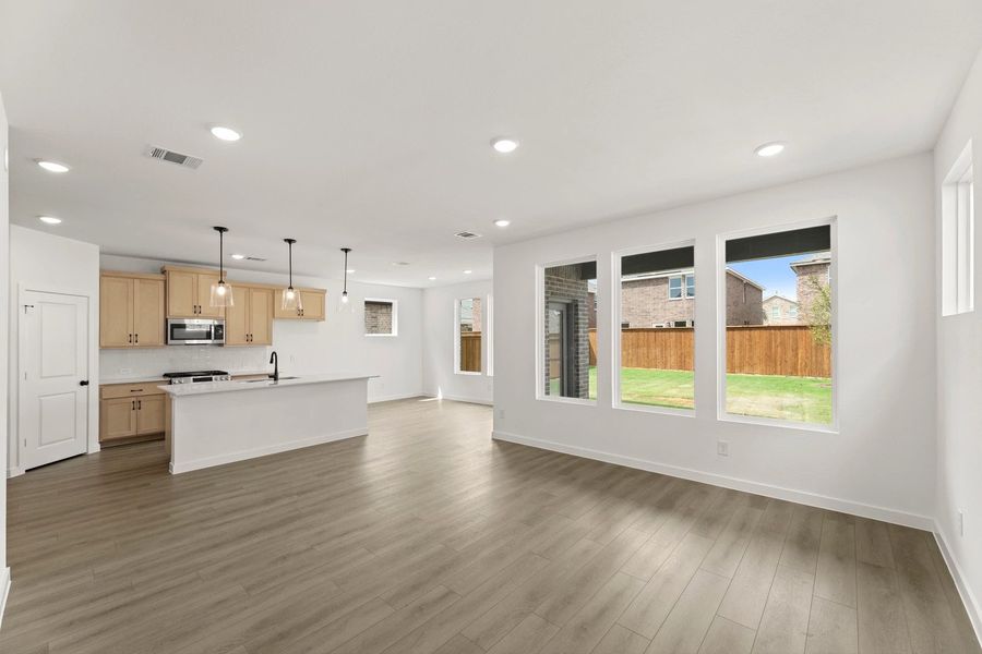 Open Kitchen-Living-Dining Room featuring the Artisan Collection