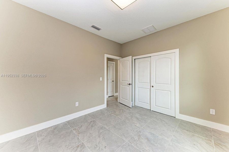 Spacious, unfurnished interior of a new home in , North Port (Image 30).
