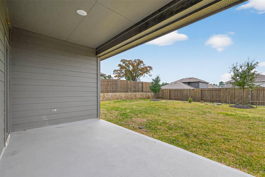Exterior details and patio area of a home in Water Crest on Lake Conroe, Conroe (Image 4).