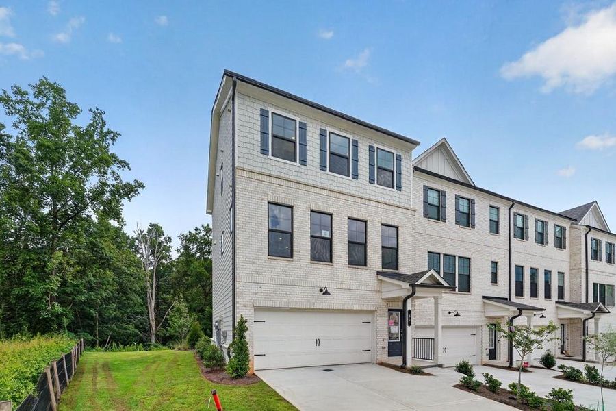 Front exterior of a new home in Rosewood Farm, Lawrenceville, GA, highlighting curb appeal (Image 27).