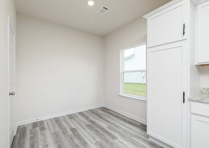 Enjoy a cup of coffee in the bright sunroom